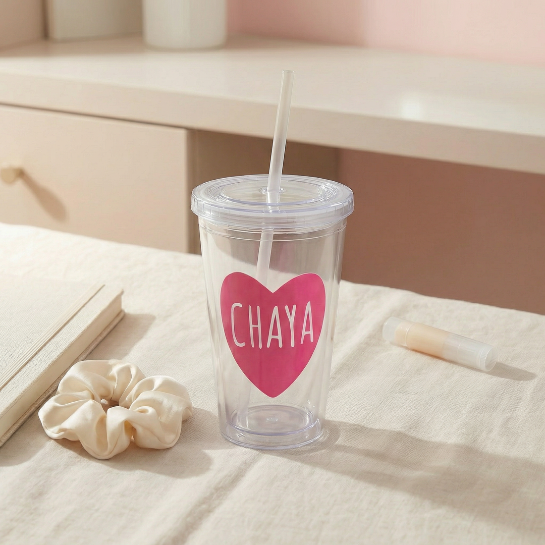 Clear tumbler with pink heart and 'CHAYA' text