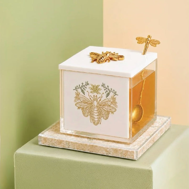 Gilded Bee marble and lucite honey dish with sculpted gold bee, lifestyle scene